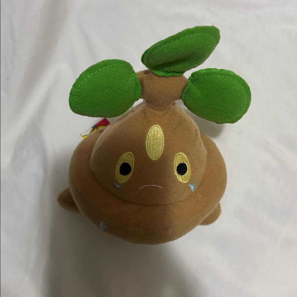 Pokemon Brown and Green Plush Toy